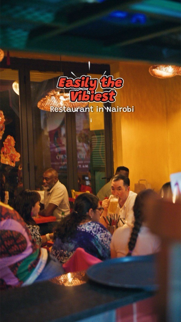 Guests at a lively evening table at Mammam