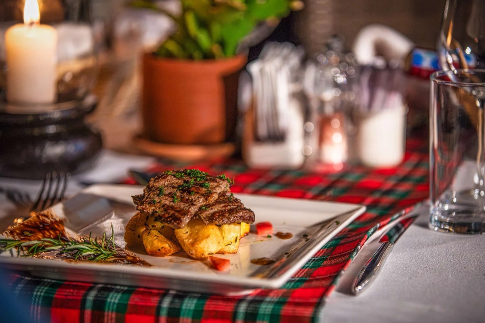 Plated main course on a Maasai shuka tablecloth